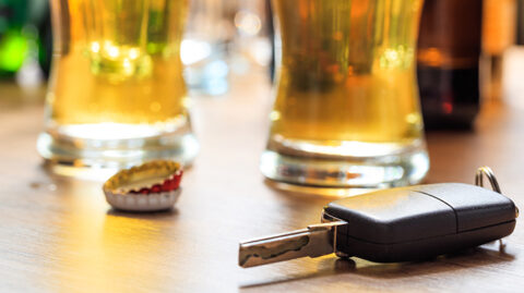 Beer glasses next to car key